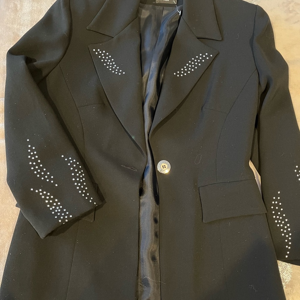 A skirt suit made by Sandro